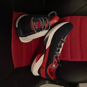 Red white and blue Reebok split fuel